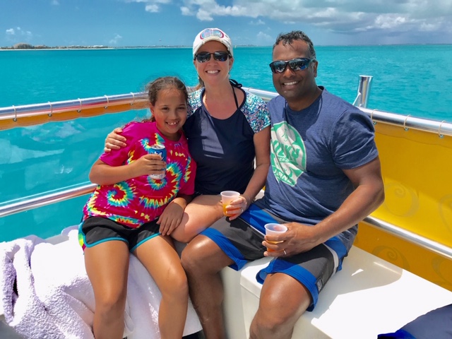 Dr. Vuppala enjoying a recent Carribean trip with his wife and daughter